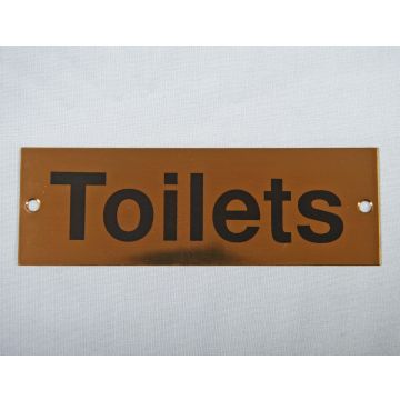 150Mm X 50Mm Polished Brass Toilets Sign